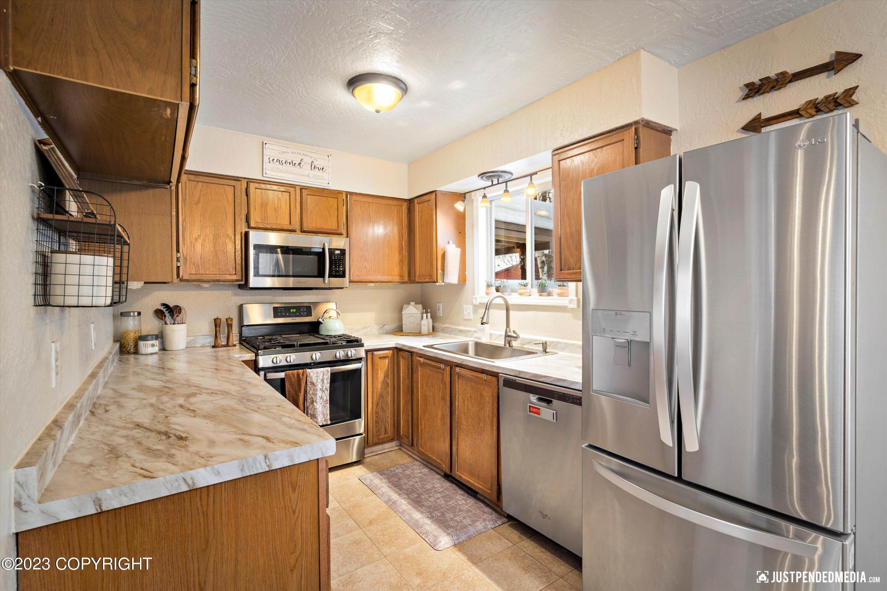10. Single Family Homes for Sale at 3161 E 64th Avenue Anchorage, Alaska 99507 United States